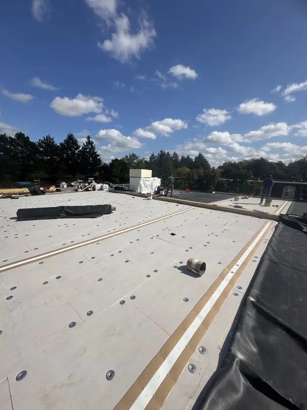 Flat roof membrane installation in progress in Calgary
