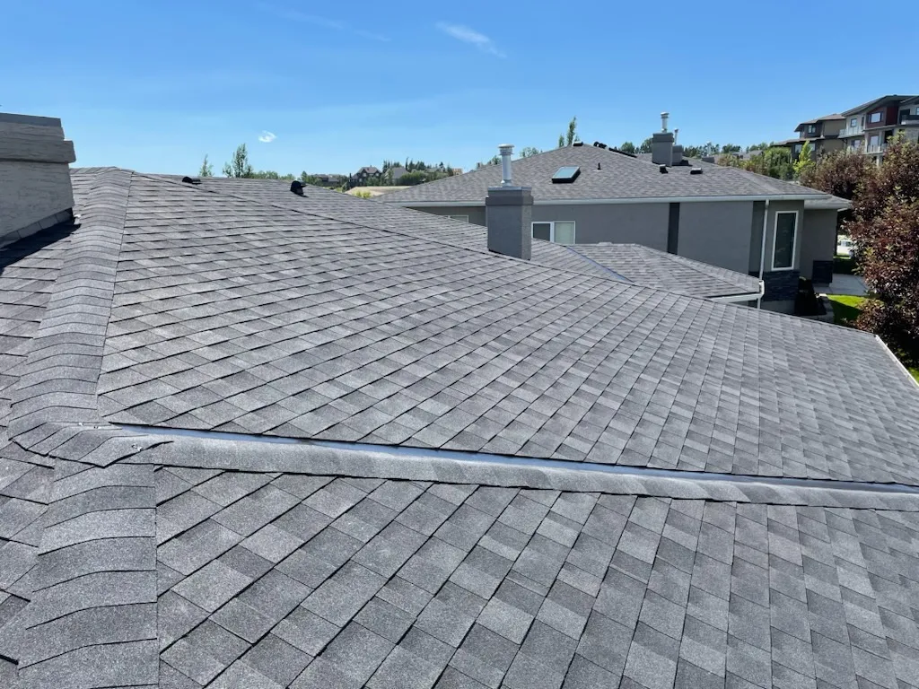 Finished residential asphalt shingle roof repair in Calgary
