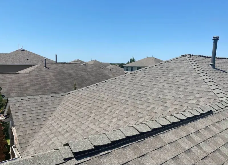 Grey-tan suburban reroof, NE Calgary