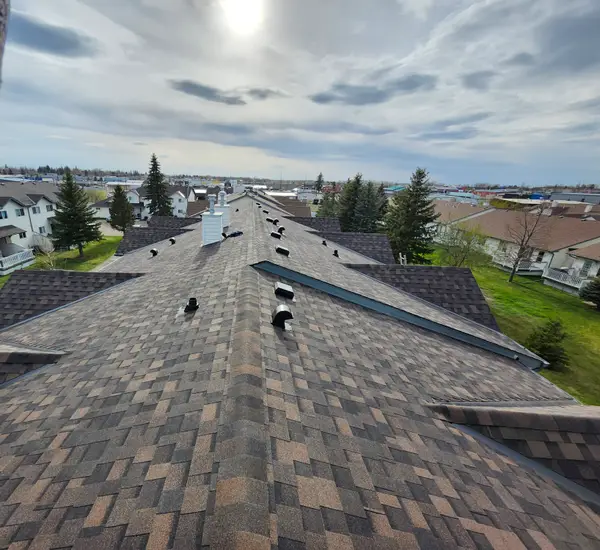 Finished Class 4 hail-resistant roof in Calgary by Top Star Roofing