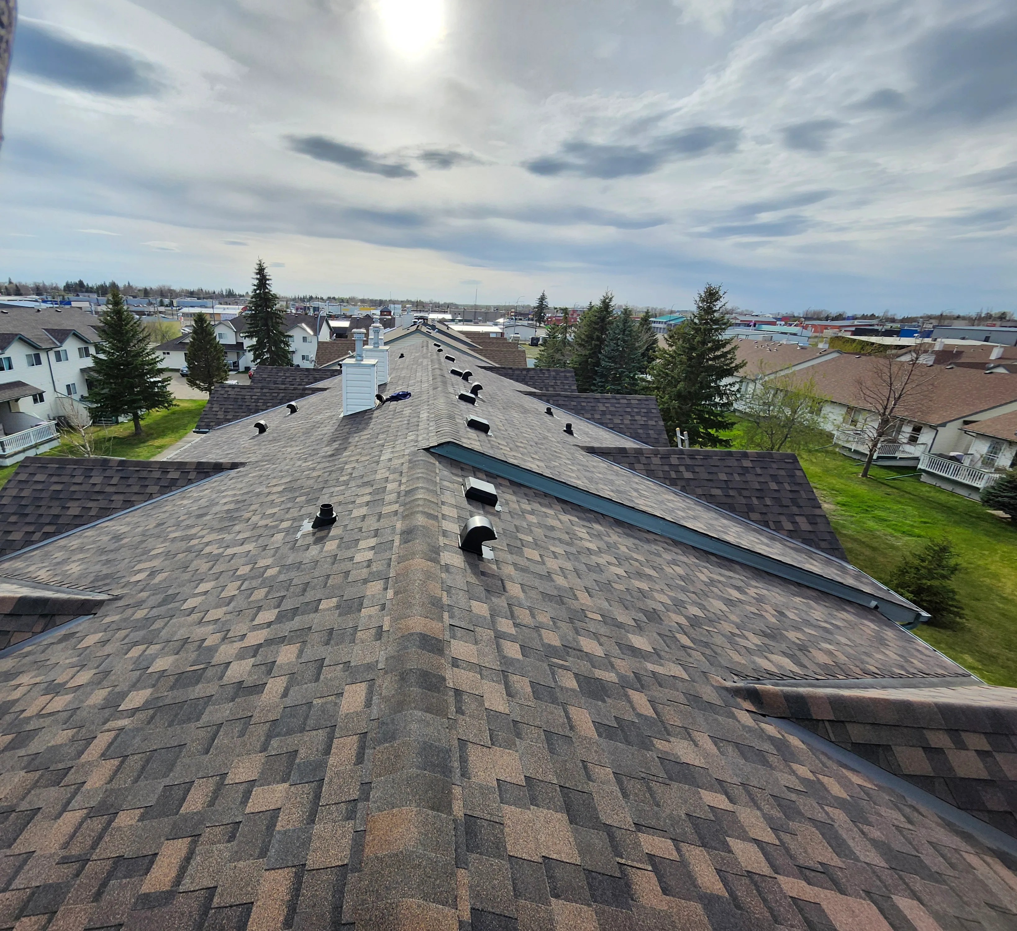 Finished residential asphalt shingle roof repair in Calgary