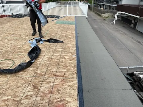 Attic rain and moisture damage on a Calgary roof deck