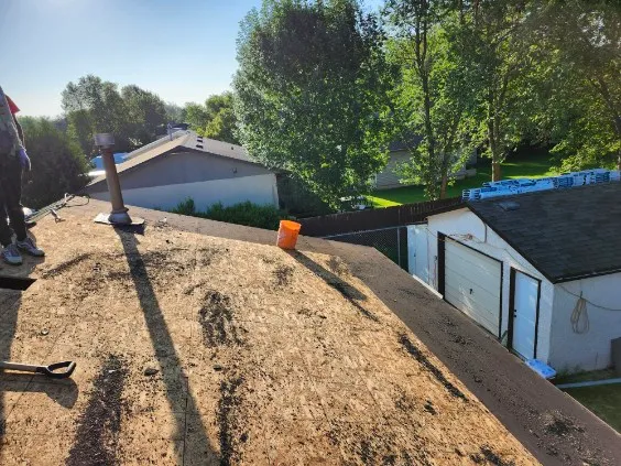 Attic rain and moisture damage on a Calgary roof deck