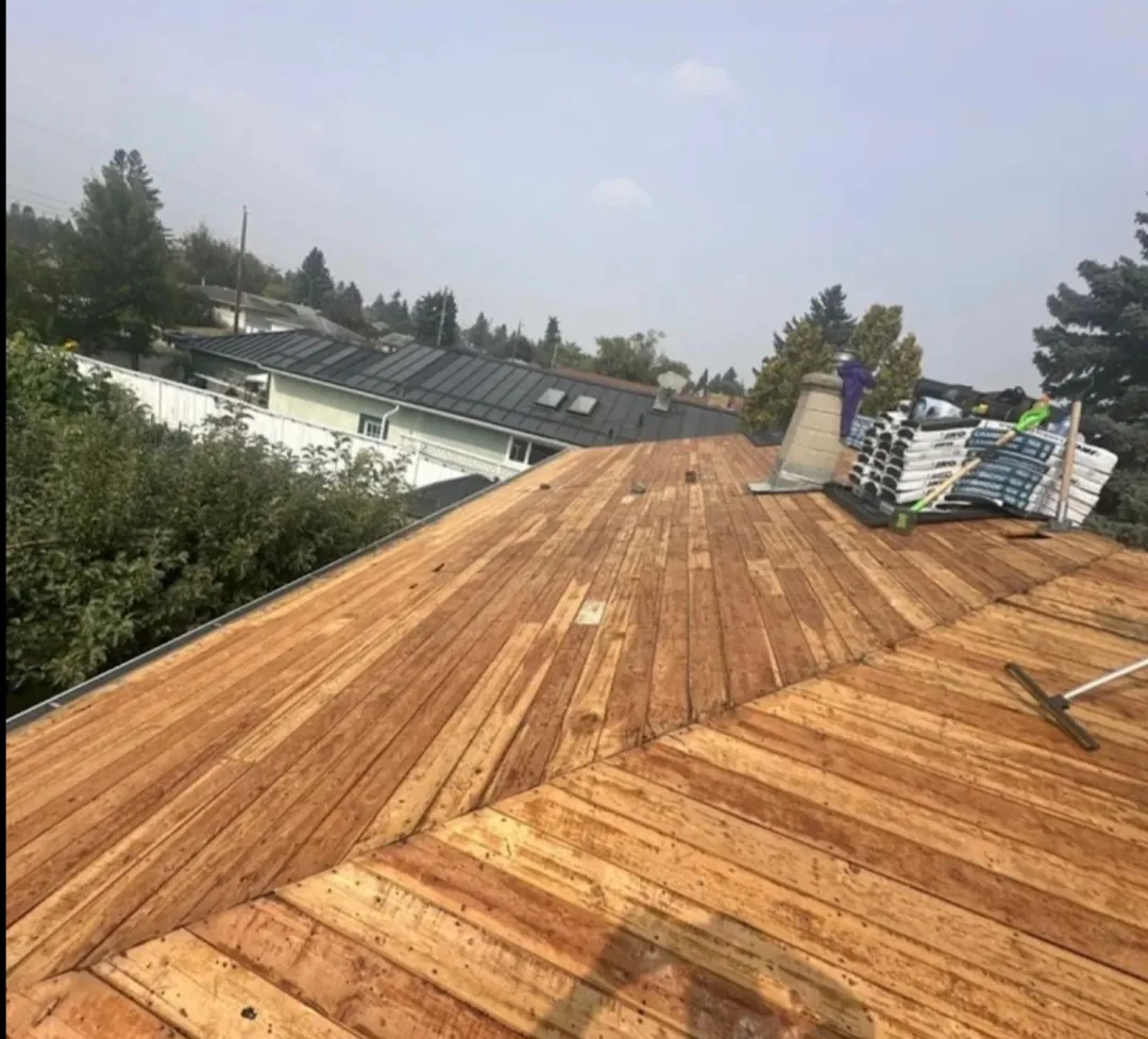 Attic rain and moisture damage on a Calgary roof deck